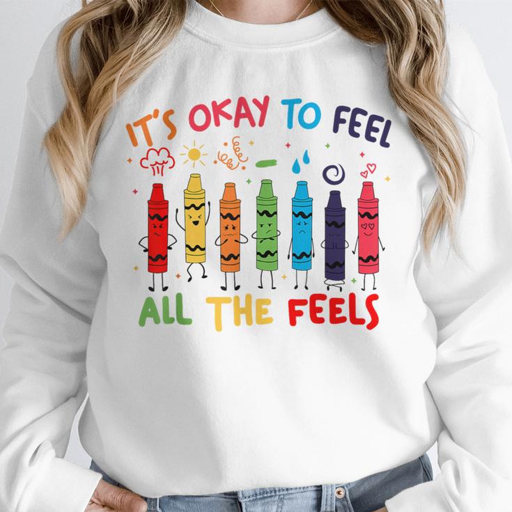 Its Okay To Feel All The Feels Mood Color Crayons Teacher Unisex Sweatshirt, novelty gifts, funny gifts Its Okay To Feel All The Feels Mood Color Crayons Teacher Unisex Sweatshirt, novelty gifts, funny gifts