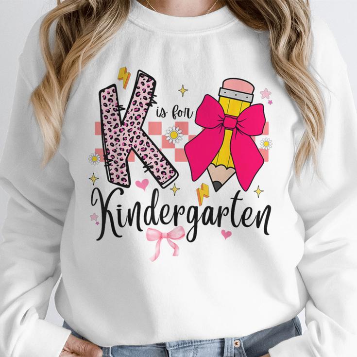 K Is For Kindergarten Teacher Coquette Bow Back To School Unisex Sweatshirt, novelty gifts, funny gifts K Is For Kindergarten Teacher Coquette Bow Back To School Unisex Sweatshirt, novelty gifts, funny gifts