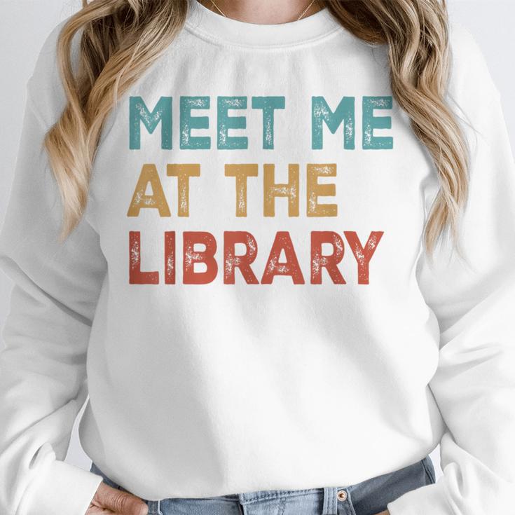 Meet Me At The Library For Teachers And School Librarians Unisex Sweatshirt, novelty gifts, funny gifts Meet Me At The Library For Teachers And School Librarians Unisex Sweatshirt, novelty gifts, funny gifts