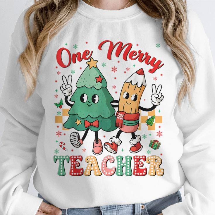 One Merry Teacher Groovy Christmas Tree Pjs Xmas Teacher Unisex Sweatshirt, novelty gifts, funny gifts One Merry Teacher Groovy Christmas Tree Pjs Xmas Teacher Unisex Sweatshirt, novelty gifts, funny gifts