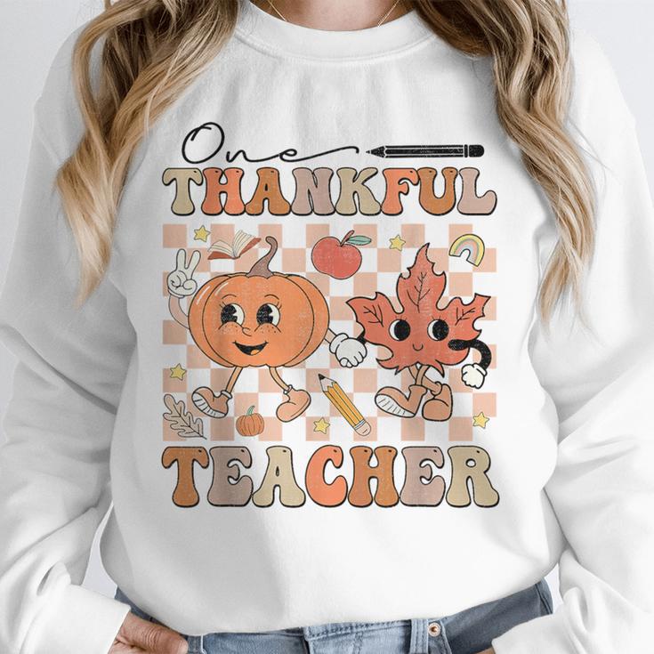 One Thankful Teacher Thanksgiving Groovy Fall Autumn Teacher Unisex Sweatshirt, novelty gifts, funny gifts One Thankful Teacher Thanksgiving Groovy Fall Autumn Teacher Unisex Sweatshirt, novelty gifts, funny gifts