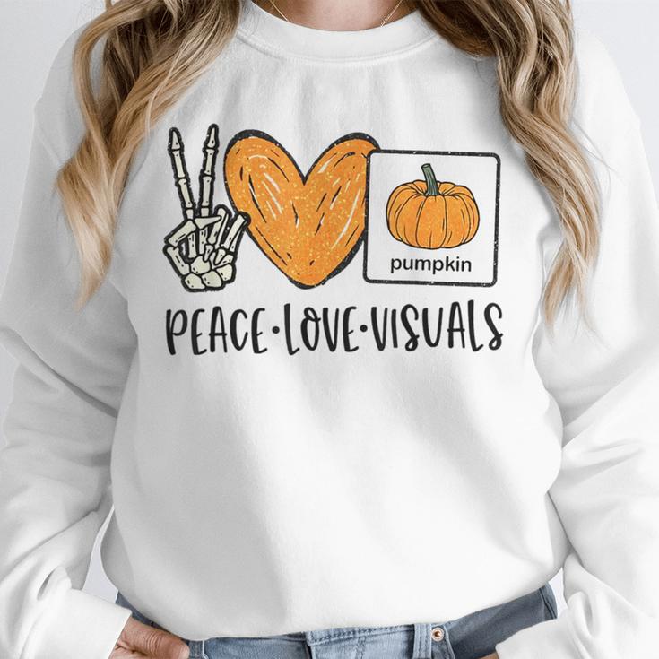 Peace Love Visuals Sped Teacher Pumpkin Skeleton Halloween Unisex Sweatshirt, novelty gifts, funny gifts Peace Love Visuals Sped Teacher Pumpkin Skeleton Halloween Unisex Sweatshirt, novelty gifts, funny gifts
