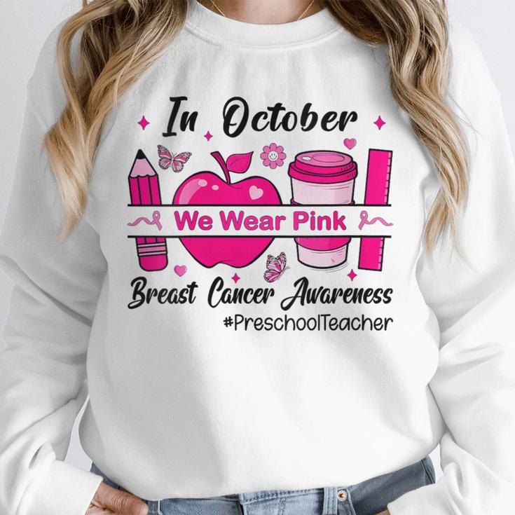 Preschool Teacher In October We Wear Pink Breast Cancer Unisex Sweatshirt, novelty gifts, funny gifts