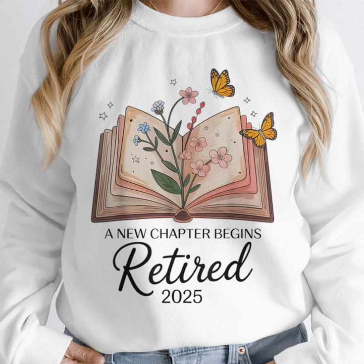 Retired 2025 A New Chapter Begins Retirement Teacher Book Unisex Sweatshirt, novelty gifts, funny gifts
