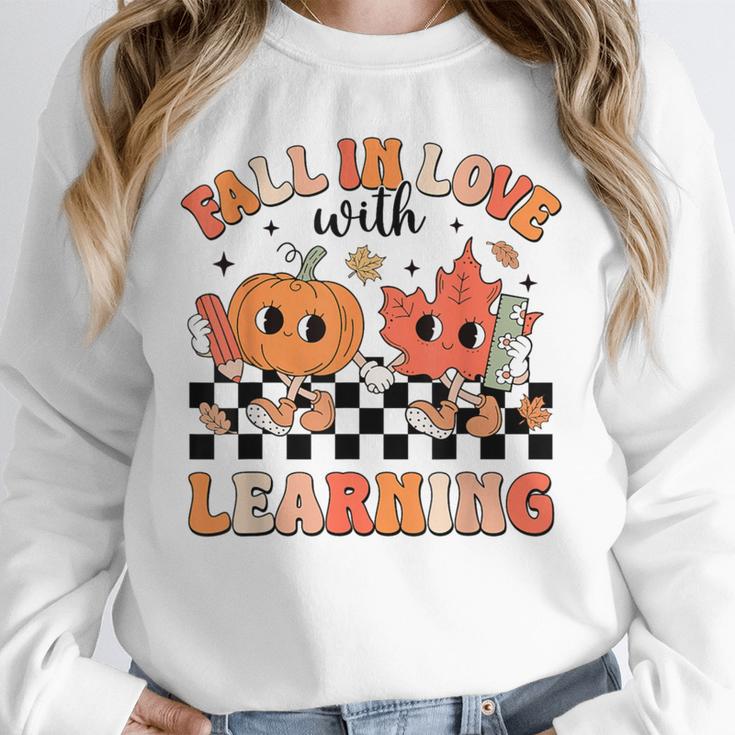 Retro Fall In Love With Learning Autumn Pumpkin Teacher Unisex Sweatshirt, novelty gifts, funny gifts Retro Fall In Love With Learning Autumn Pumpkin Teacher Unisex Sweatshirt, novelty gifts, funny gifts