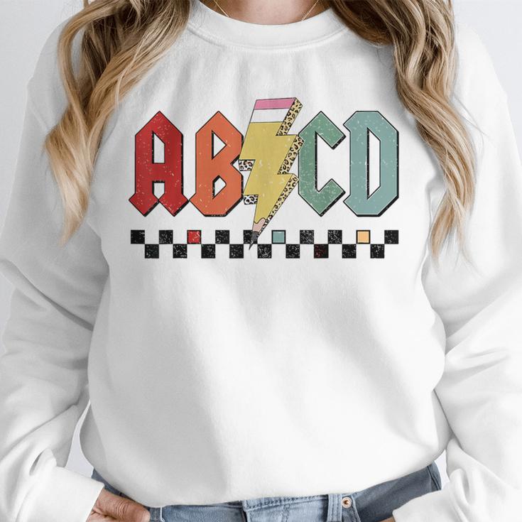Rock Abcd Back To School Abcd Preschool Teacher Appreciation Unisex Sweatshirt, novelty gifts, funny gifts Rock Abcd Back To School Abcd Preschool Teacher Appreciation Unisex Sweatshirt, novelty gifts, funny gifts