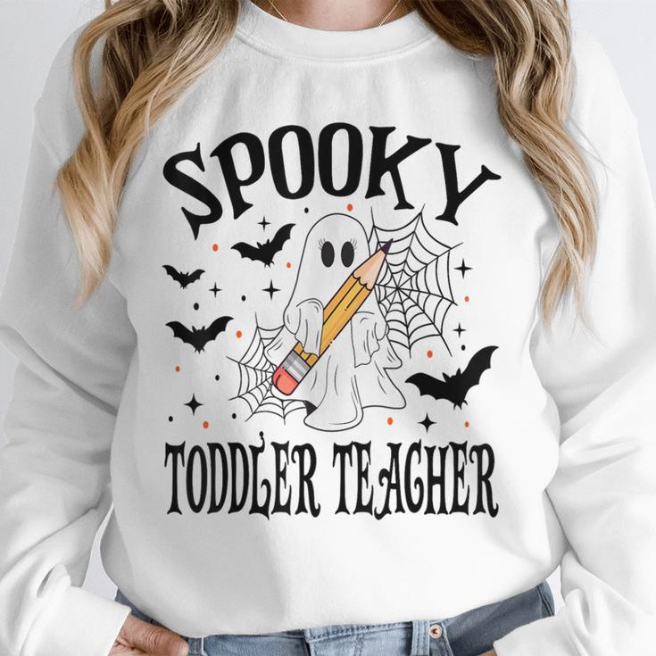 Spooky Toddler Teacher Halloween School Unisex Sweatshirt, novelty gifts, funny gifts Spooky Toddler Teacher Halloween School Unisex Sweatshirt, novelty gifts, funny gifts