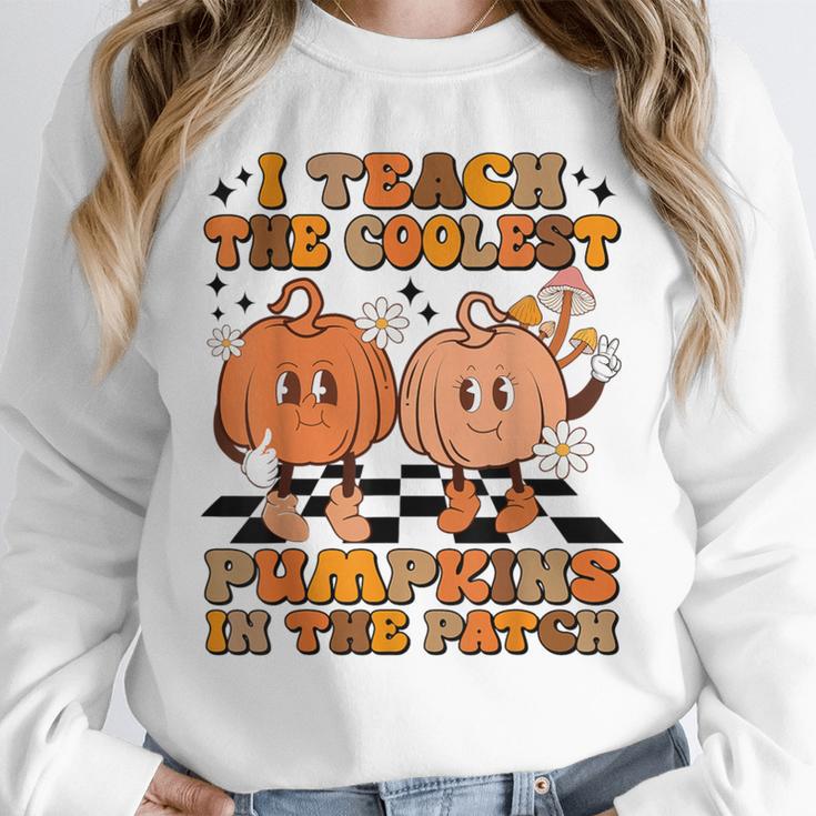 I Teach The Coolest Pumpkins In The Patch Teacher Halloween Unisex Sweatshirt, novelty gifts, funny gifts I Teach The Coolest Pumpkins In The Patch Teacher Halloween Unisex Sweatshirt, novelty gifts, funny gifts