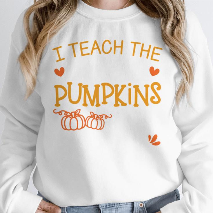 I Teach The Cutest Pumpkins In The Patch Shirt Teacher Unisex Sweatshirt, novelty gifts, funny gifts
