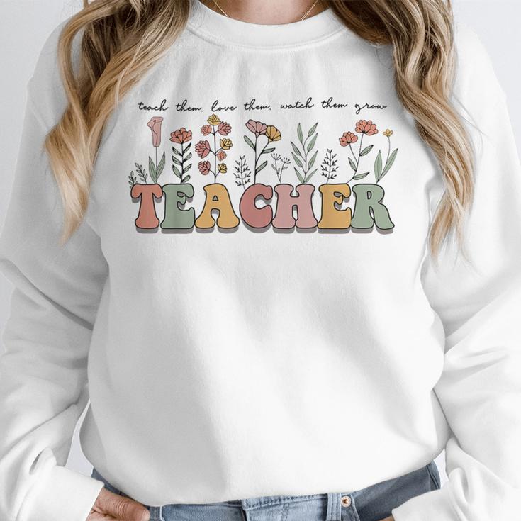 Teach Them Love Them Watch Them Grow Teacher Unisex Sweatshirt, novelty gifts, funny gifts Teach Them Love Them Watch Them Grow Teacher Unisex Sweatshirt, novelty gifts, funny gifts