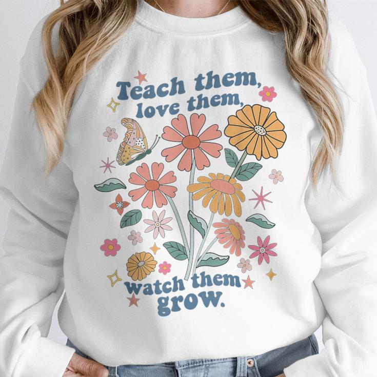 Teach Them Love Them Watch Them Grow Retro Teacher Floral Unisex Sweatshirt, novelty gifts, funny gifts