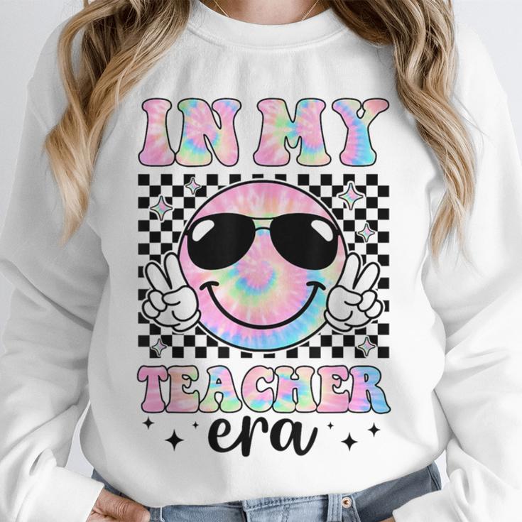 In My Teacher Era Groovy Tie Dye Back To School Cute Teacher Unisex Sweatshirt, novelty gifts, funny gifts In My Teacher Era Groovy Tie Dye Back To School Cute Teacher Unisex Sweatshirt, novelty gifts, funny gifts