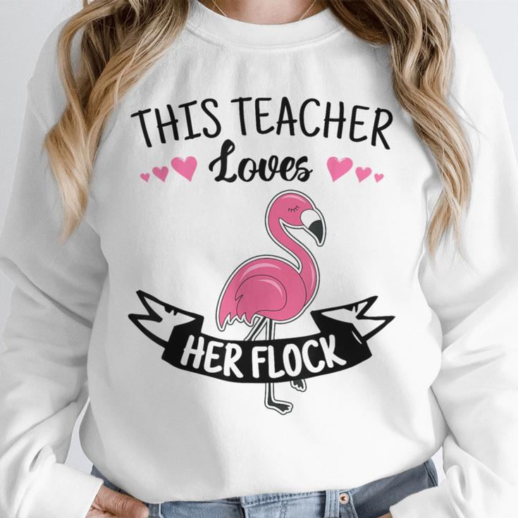This Teacher Loves Her Flock Cute Flamingo Teacher Unisex Sweatshirt, novelty gifts, funny gifts This Teacher Loves Her Flock Cute Flamingo Teacher Unisex Sweatshirt, novelty gifts, funny gifts