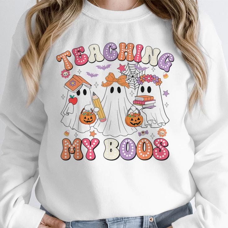 Teaching My Boos Cute Spooky Ghost Teacher Halloween Women Unisex Sweatshirt, novelty gifts, funny gifts Teaching My Boos Cute Spooky Ghost Teacher Halloween Women Unisex Sweatshirt, novelty gifts, funny gifts