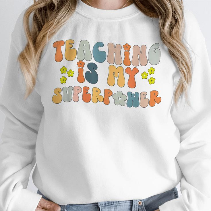 Teaching Is My Superpower Vintage Groovy University Teacher Unisex Sweatshirt, novelty gifts, funny gifts