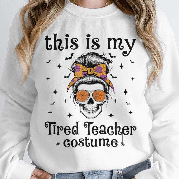 This Is My Tired Teacher Costume Skull Halloween Messy Bun Unisex Sweatshirt, novelty gifts, funny gifts This Is My Tired Teacher Costume Skull Halloween Messy Bun Unisex Sweatshirt, novelty gifts, funny gifts