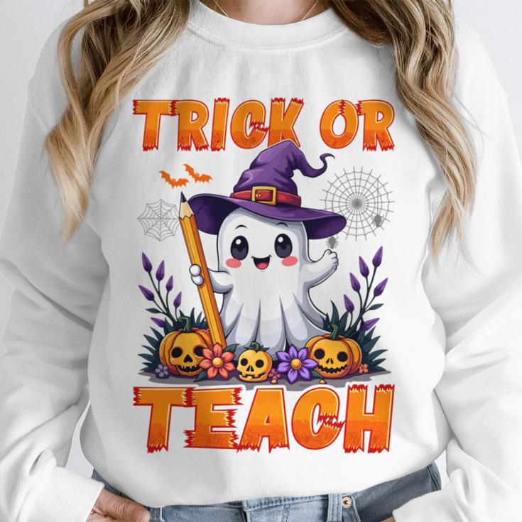 Trick Or Teach Teacher Halloween Ghost Pencil Floral Unisex Sweatshirt, novelty gifts, funny gifts