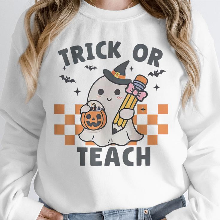 Trick Or Teach Teacher Unisex Sweatshirt, novelty gifts, funny gifts Trick Or Teach Teacher Unisex Sweatshirt, novelty gifts, funny gifts