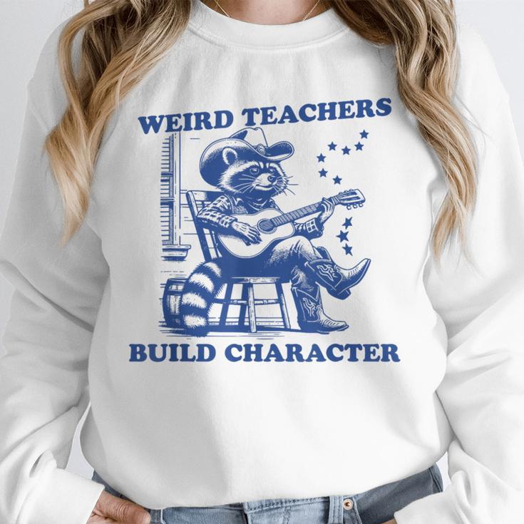 Weird Teachers Build Character Shirt Raccoon Teacher Unisex Sweatshirt, novelty gifts, funny gifts Weird Teachers Build Character Shirt Raccoon Teacher Unisex Sweatshirt, novelty gifts, funny gifts