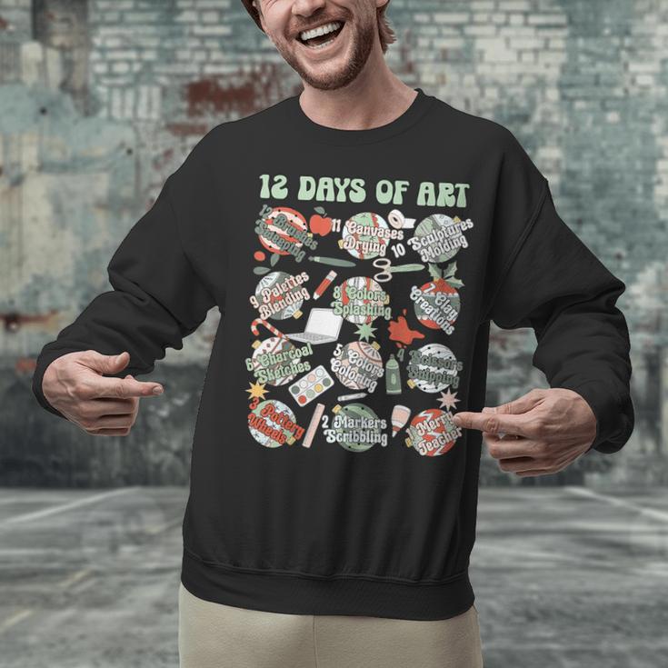 12 Days Of Art Teacher Christmas Artists Painter Educational Unisex Sweatshirt, gift for family, gift for coworker 12 Days Of Art Teacher Christmas Artists Painter Educational Unisex Sweatshirt, gift for family, gift for coworker