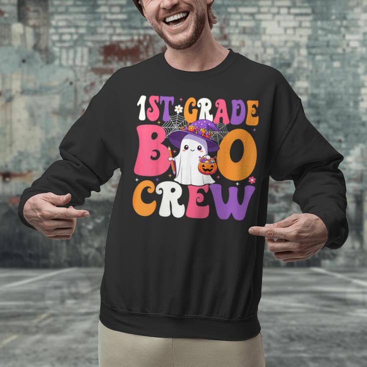 1st Grade Boo Crew Halloween First Grade Halloween Teacher Unisex Sweatshirt, First Grade Teacher Sweatshirts, gift for family, gift for coworker