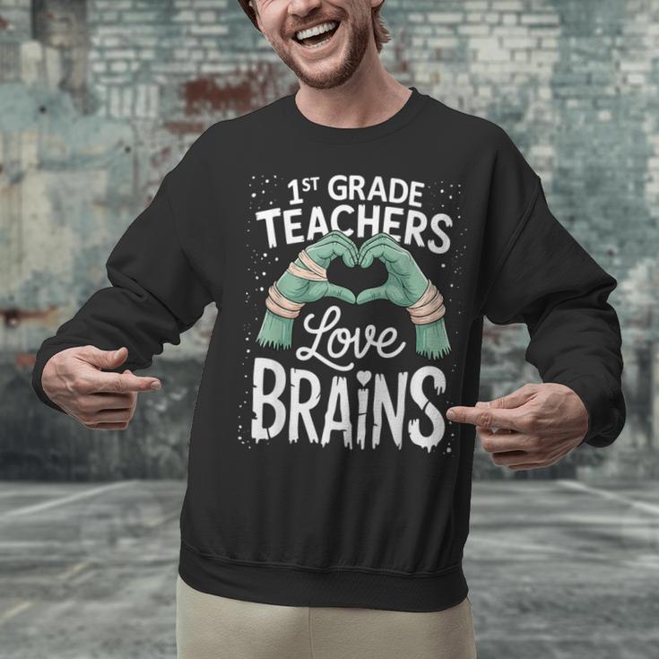 1st Grade Teachers Love Brains Shirt Halloween Teacher Unisex Sweatshirt, gift for family, gift for coworker