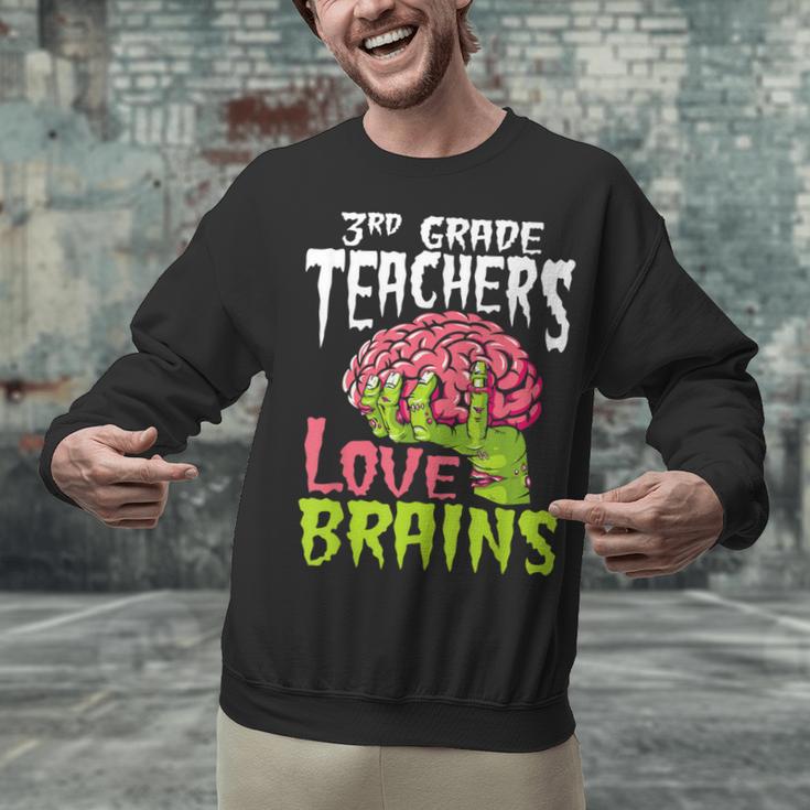 3rd Grade Teachers Love Brains Zombie Teacher Halloween Unisex Sweatshirt, gift for family, gift for coworker 3rd Grade Teachers Love Brains Zombie Teacher Halloween Unisex Sweatshirt, gift for family, gift for coworker