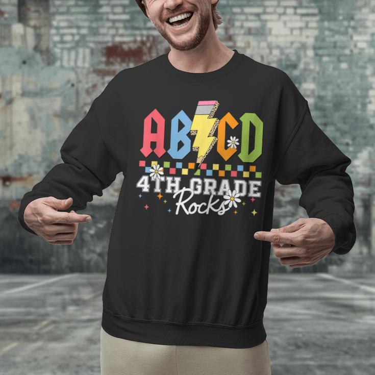 4th Grade Rocks ABCD Back To School Rock Teachers Unisex Sweatshirt, gift for family, gift for coworker