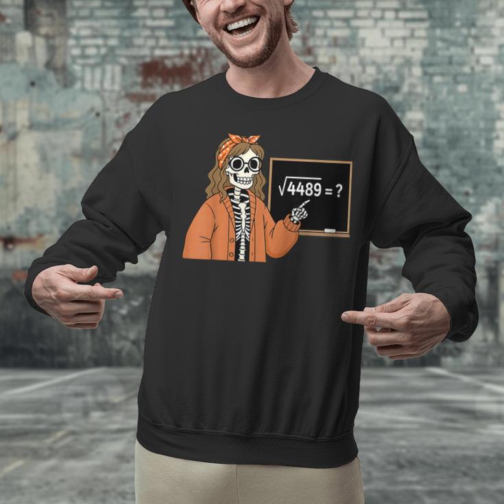 67 Math Teacher Skeleton Halloween Root 4489 Messy Bun Women Unisex Sweatshirt, gift for family, gift for coworker 67 Math Teacher Skeleton Halloween Root 4489 Messy Bun Women Unisex Sweatshirt, gift for family, gift for coworker