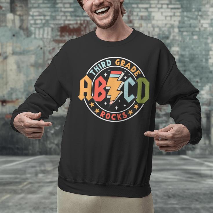 ABCD 3rd Grade Rocks Pencil Lightning Teachers Rock Boys Unisex Sweatshirt, gift for family, gift for coworker ABCD 3rd Grade Rocks Pencil Lightning Teachers Rock Boys Unisex Sweatshirt, gift for family, gift for coworker