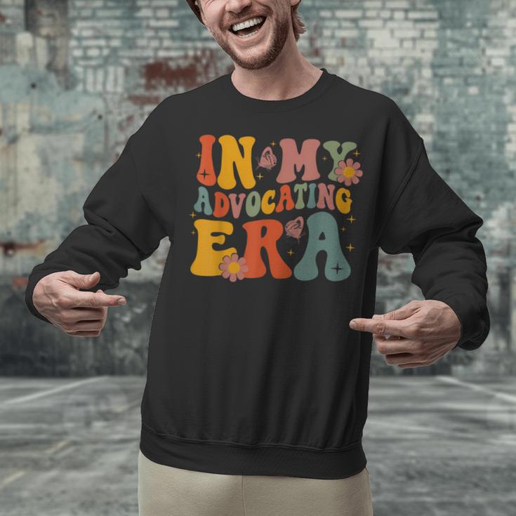 In My Advocating Era Advocate Autism Awareness Sped Teacher Men Women Kids Unisex Sweatshirt, gift for family, gift for coworker In My Advocating Era Advocate Autism Awareness Sped Teacher Men Women Kids Unisex Sweatshirt, gift for family, gift for coworker