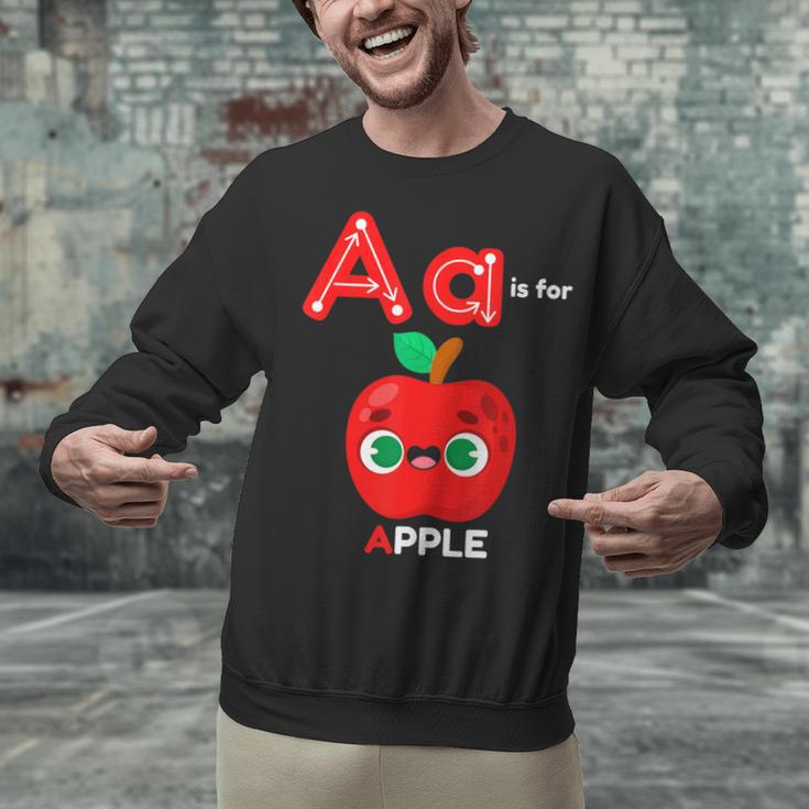 A Is For Apple Pre-K Kindergarten Teacher Student Unisex Sweatshirt, gift for family, gift for coworker A Is For Apple Pre-K Kindergarten Teacher Student Unisex Sweatshirt, gift for family, gift for coworker