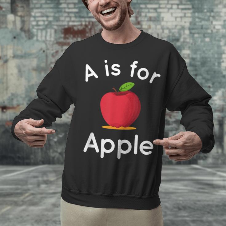 A Is For Apple Toddler Kindergarten Preschool Teacher Unisex Sweatshirt, gift for family, gift for coworker A Is For Apple Toddler Kindergarten Preschool Teacher Unisex Sweatshirt, gift for family, gift for coworker