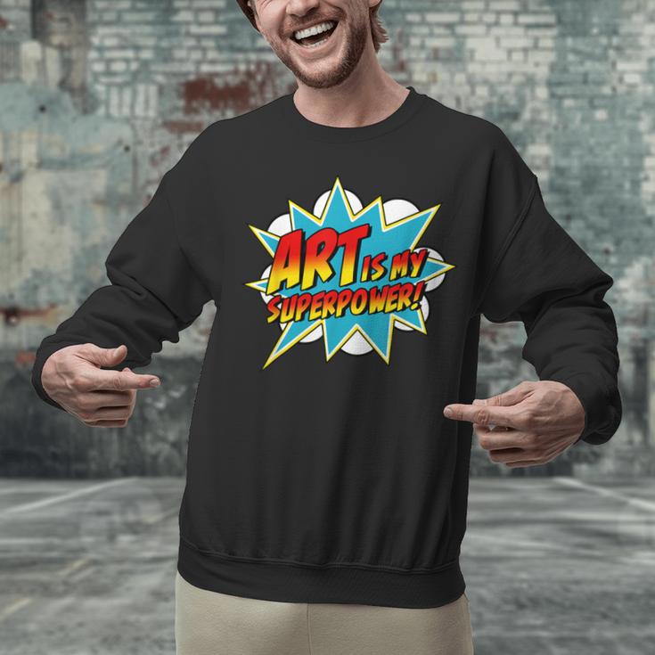 Art Is My Superpower Comic Artist Art Teacher Superhero Unisex Sweatshirt, gift for family, gift for coworker Art Is My Superpower Comic Artist Art Teacher Superhero Unisex Sweatshirt, gift for family, gift for coworker