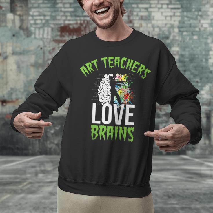 Art Teachers Love Brains Shirt Halloween Zombie Teaching Tee Men Women Kids Unisex Sweatshirt, gift for family, gift for coworker Art Teachers Love Brains Shirt Halloween Zombie Teaching Tee Men Women Kids Unisex Sweatshirt, gift for family, gift for coworker