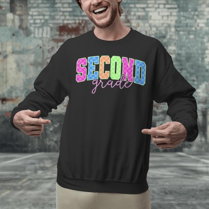 Back To School Neon Checkered Second Grade Colorful Teacher Unisex Sweatshirt, gift for family, gift for coworker Back To School Neon Checkered Second Grade Colorful Teacher Unisex Sweatshirt, gift for family, gift for coworker