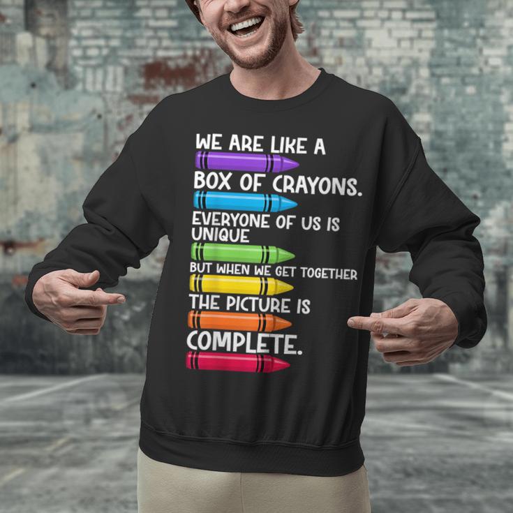Back To School Teacher We Are Like A Box Of Crayons Unisex Sweatshirt, gift for family, gift for coworker Back To School Teacher We Are Like A Box Of Crayons Unisex Sweatshirt, gift for family, gift for coworker