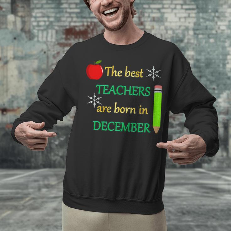 THE BEST TEACHERS ARE BORN IN DECEMBER Unisex Sweatshirt, gift for family, gift for coworker THE BEST TEACHERS ARE BORN IN DECEMBER Unisex Sweatshirt, gift for family, gift for coworker