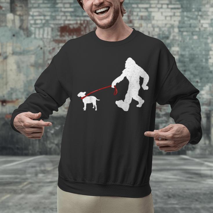 Bigfoot Walking With Bull Terrier Dog Unisex Sweatshirt, gift for family, gift for coworker