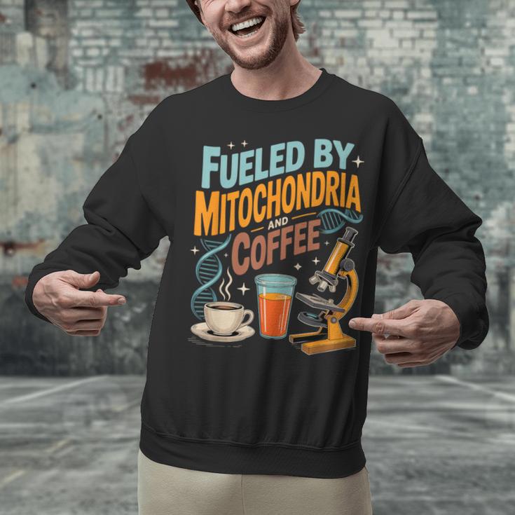 Biology Teacher Science Fueled By Mitochondria Coffee Unisex Sweatshirt, Science Teacher Sweatshirts, gift for family, gift for coworker