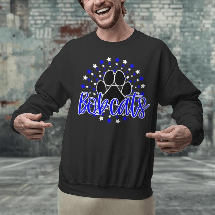 Blue Bobcats School Spirit Coquette Bow Mascot Teacher Unisex Sweatshirt, gift for family, gift for coworker Blue Bobcats School Spirit Coquette Bow Mascot Teacher Unisex Sweatshirt, gift for family, gift for coworker