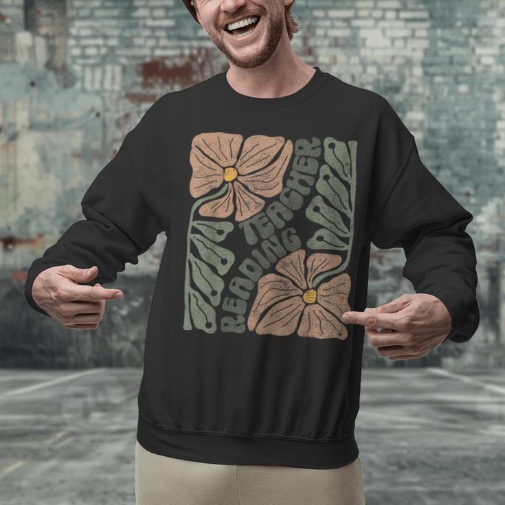Boho Floral Reading Teacher Retro Reading Specialist Wildfl Unisex Sweatshirt, gift for family, gift for coworker Boho Floral Reading Teacher Retro Reading Specialist Wildfl Unisex Sweatshirt, gift for family, gift for coworker