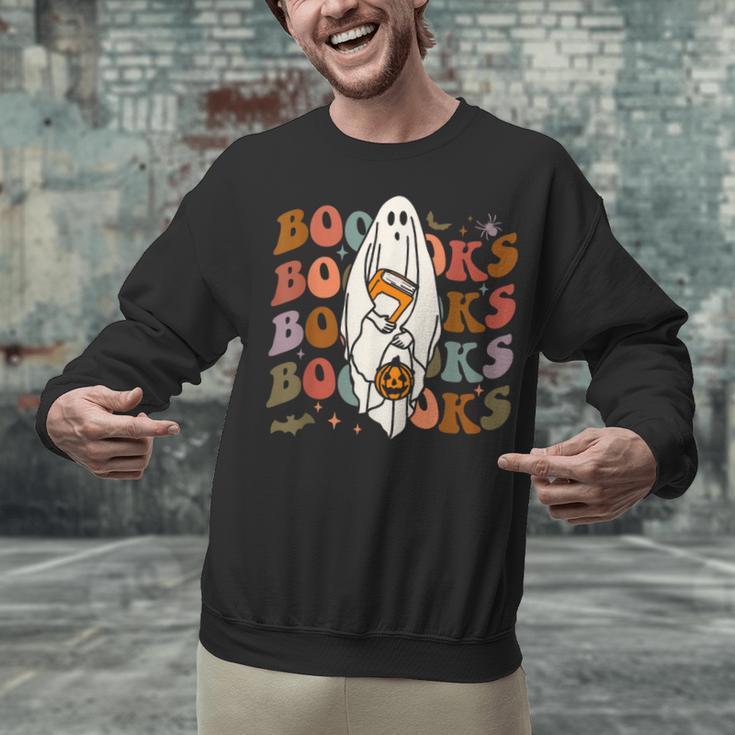 Booooks Ghost Halloween Groovy Vintage Teacher Book Reading Unisex Sweatshirt, Groovy Teacher Sweatshirts, gift for family, gift for coworker Booooks Ghost Halloween Groovy Vintage Teacher Book Reading Unisex Sweatshirt, Groovy Teacher Sweatshirts, gift for family, gift for coworker