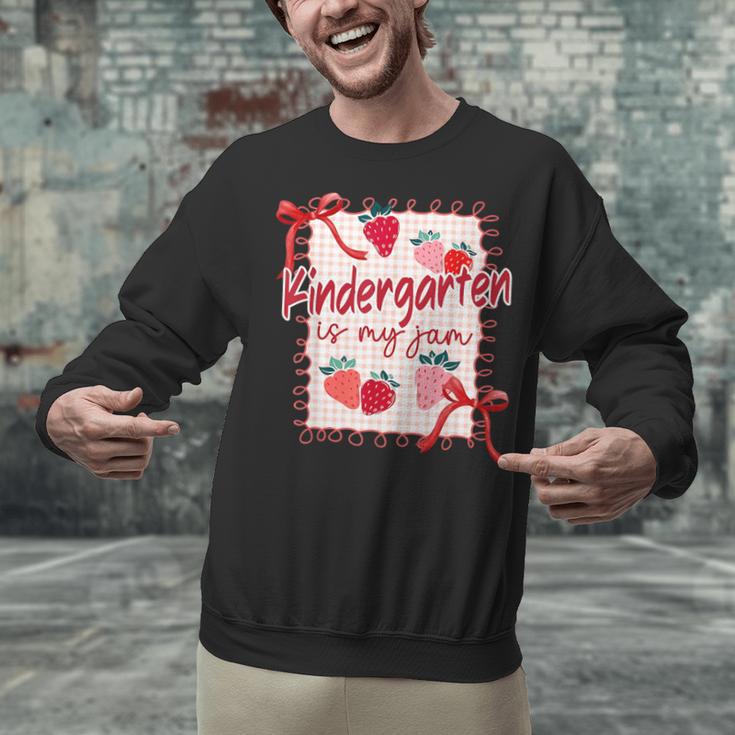 Bow Strawberry Kindergarten Is My Jam Teacher Kinder Team Unisex Sweatshirt, gift for family, gift for coworker Bow Strawberry Kindergarten Is My Jam Teacher Kinder Team Unisex Sweatshirt, gift for family, gift for coworker