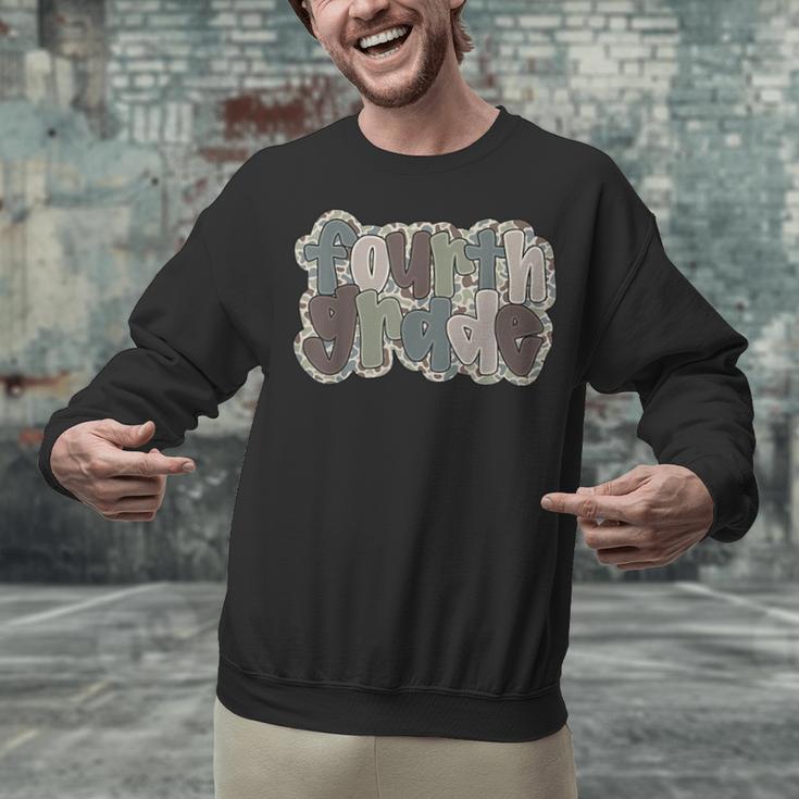 Camo Team 4th Grade Squad Back To School Teacher Kids Boys Unisex Sweatshirt, 4th Grade Teacher Sweatshirts, gift for family, gift for coworker Camo Team 4th Grade Squad Back To School Teacher Kids Boys Unisex Sweatshirt, 4th Grade Teacher Sweatshirts, gift for family, gift for coworker