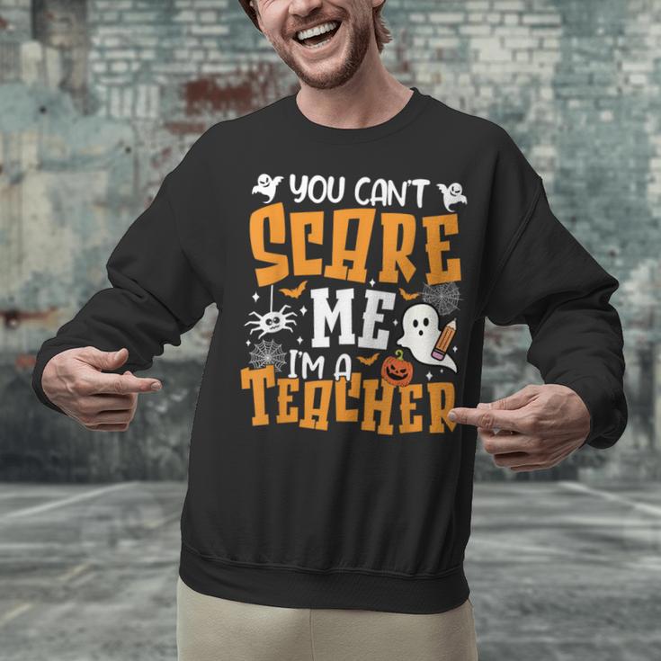 You Can't Scare Me I'm A Teacher Halloween Spooky Season Unisex Sweatshirt, gift for family, gift for coworker You Can't Scare Me I'm A Teacher Halloween Spooky Season Unisex Sweatshirt, gift for family, gift for coworker