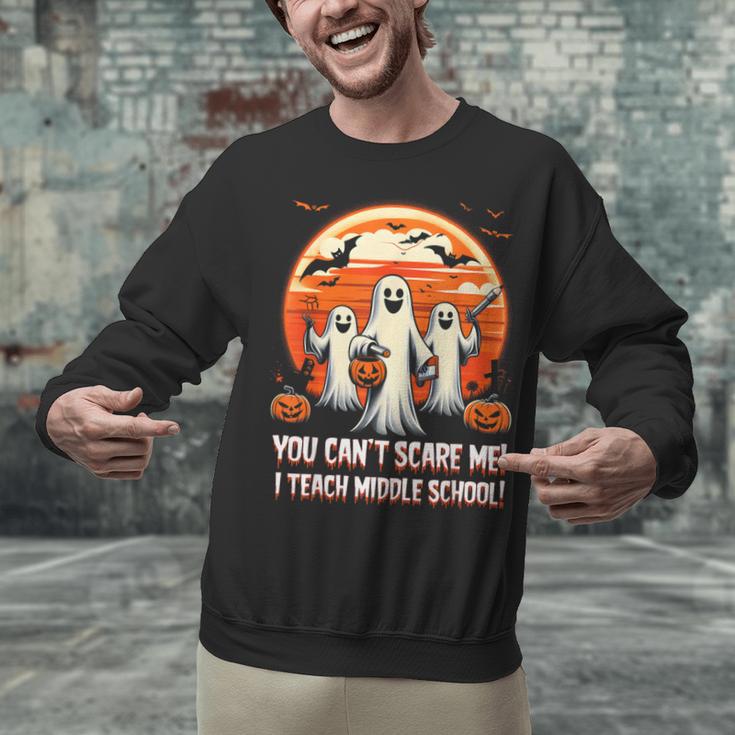You Can't Scare Me I Teach Middle School Teacher Halloween Unisex Sweatshirt, gift for family, gift for coworker You Can't Scare Me I Teach Middle School Teacher Halloween Unisex Sweatshirt, gift for family, gift for coworker
