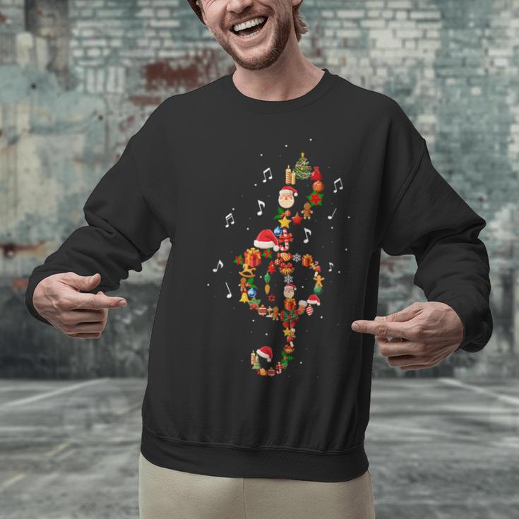 Christmas Musical Note Music Lover Teacher Sing Carols Jesus Unisex Sweatshirt, gift for family, gift for coworker Christmas Musical Note Music Lover Teacher Sing Carols Jesus Unisex Sweatshirt, gift for family, gift for coworker