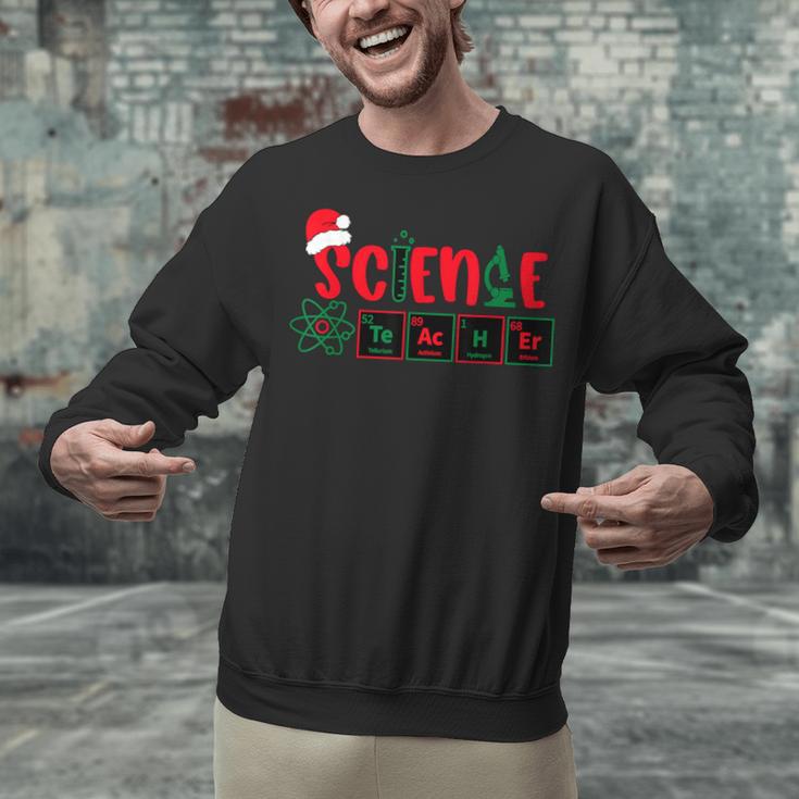 Christmas Science Teacher Santa Educator Chemical Elements Unisex Sweatshirt, Science Teacher Sweatshirts, gift for family, gift for coworker Christmas Science Teacher Santa Educator Chemical Elements Unisex Sweatshirt, Science Teacher Sweatshirts, gift for family, gift for coworker