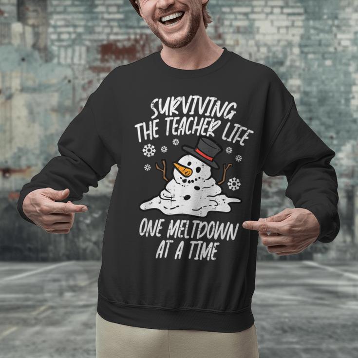 Christmas Surviving Teacher Life Meltdown Xmas Women Men Unisex Sweatshirt, gift for family, gift for coworker Christmas Surviving Teacher Life Meltdown Xmas Women Men Unisex Sweatshirt, gift for family, gift for coworker